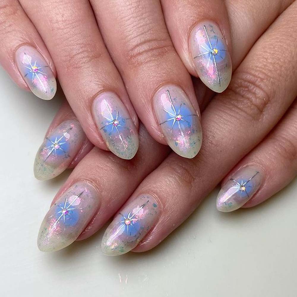 Pastel Blue Stars New Years Nails