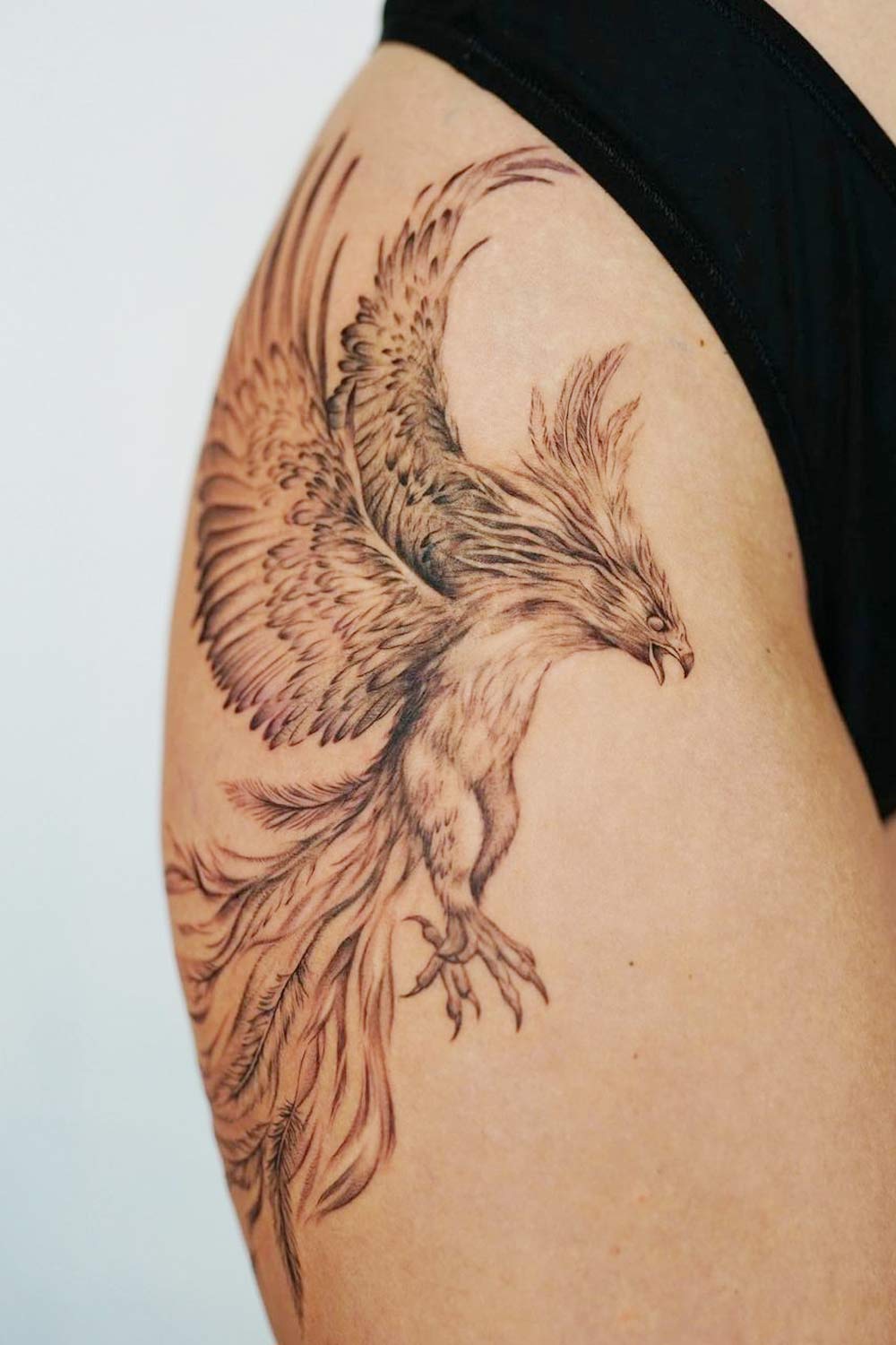 Thigh Phoenix Tattoo