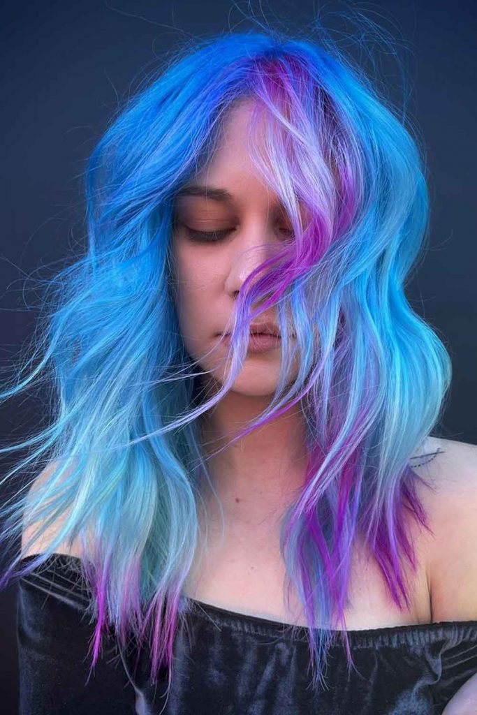 Vibrant Blue Hair with Purple Highlights