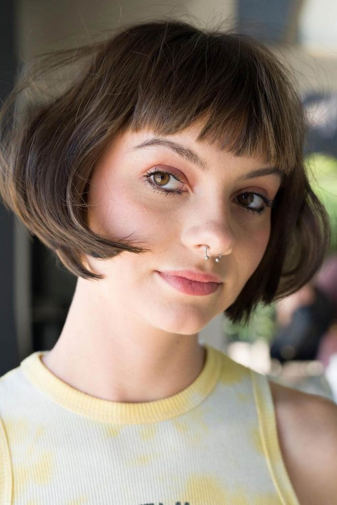 Retro Flair: Curled Under Bob with Feathered Bangs
