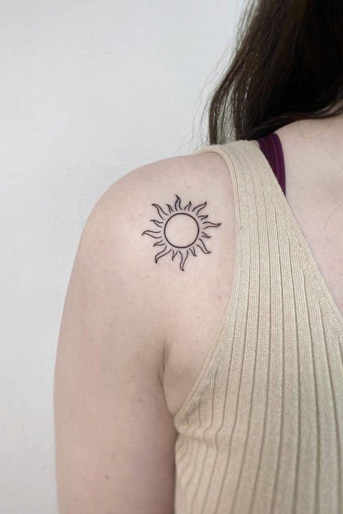 Minimalist Sun Tattoo on the Shoulder