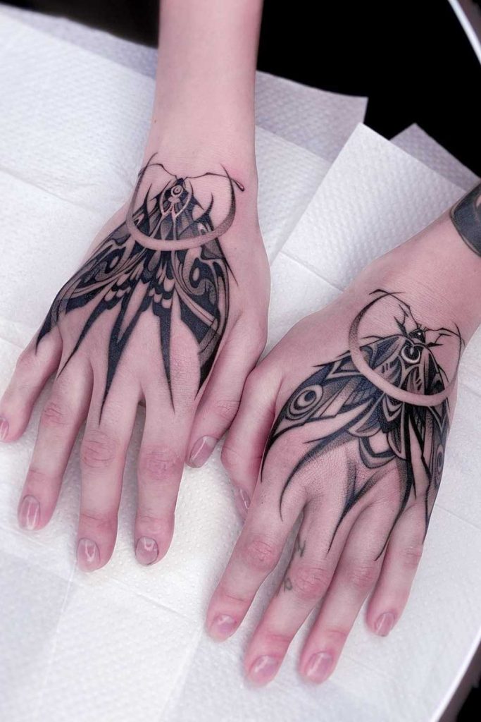 Hand Butterflies Tattoo