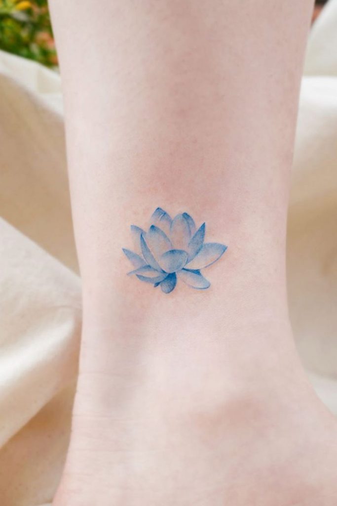 Lotus flower tattoo located on the ankle.