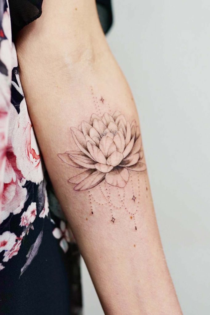 Stardust Bloom - Lotus Arm Tattoo