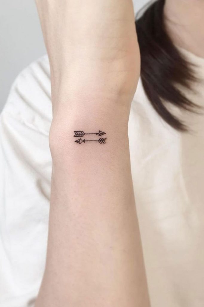 Twin Arrows Tattoo on Wrist