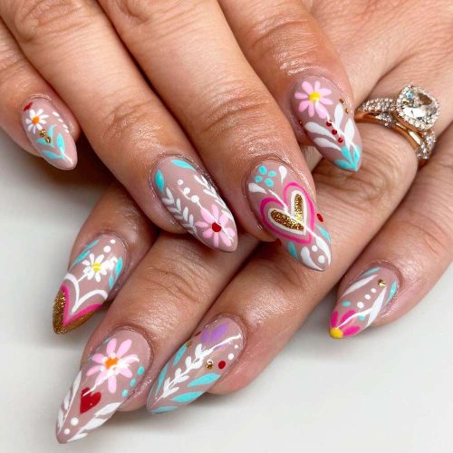 Nude Nails With Glitter And Flowers Pattern