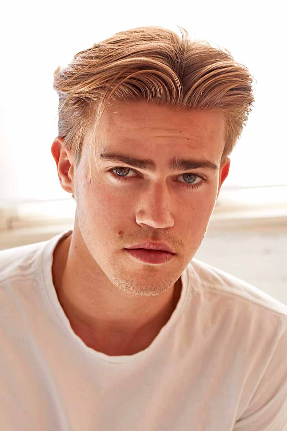 best-mens-haircuts-swept-back-middle-part.jpg