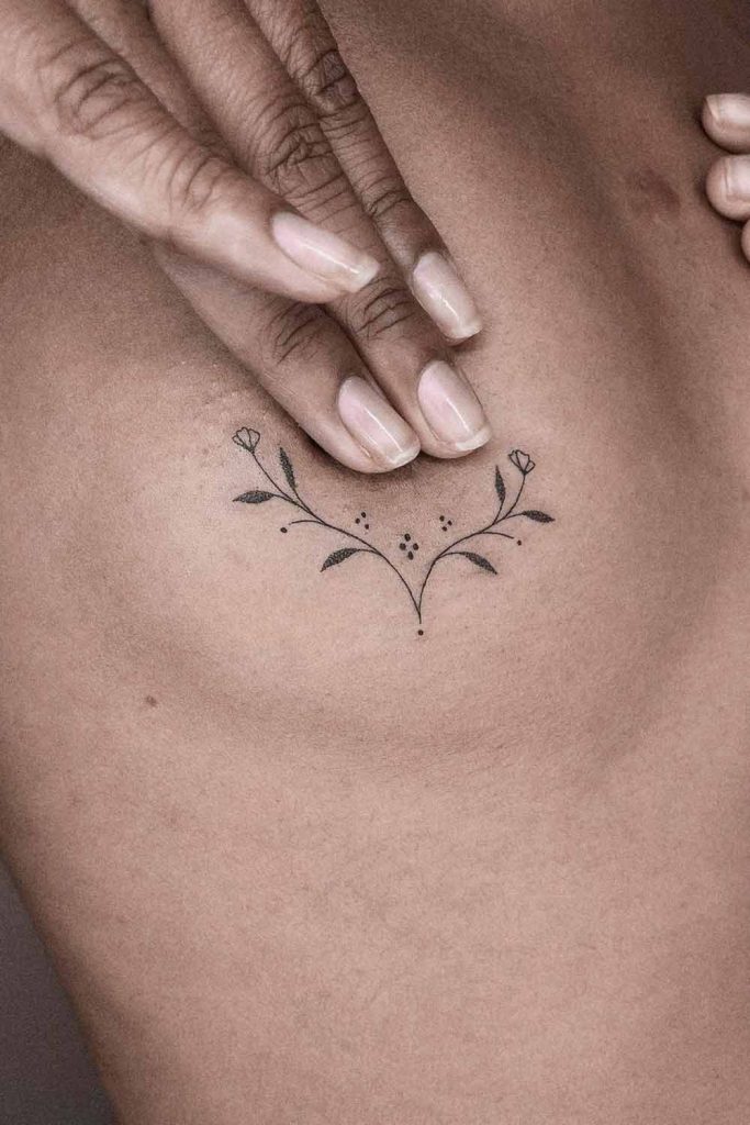 Small Breast Fine Line Tattoo