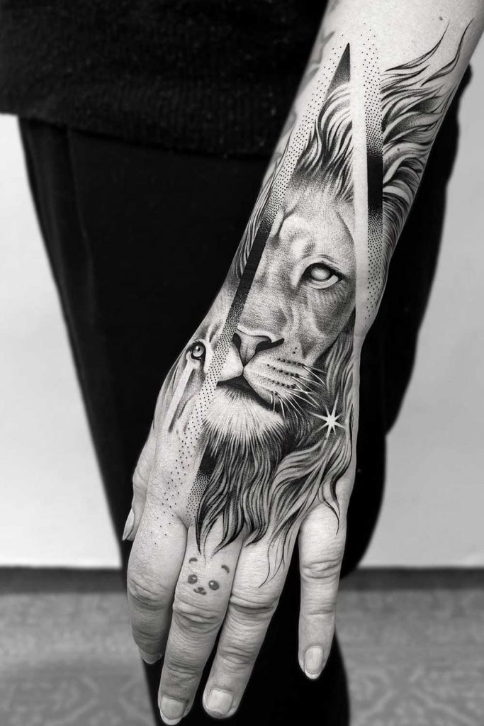 Dark Hand Tattoo With Lion Portrait