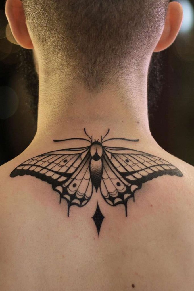 Back Neck Moth Tattoo