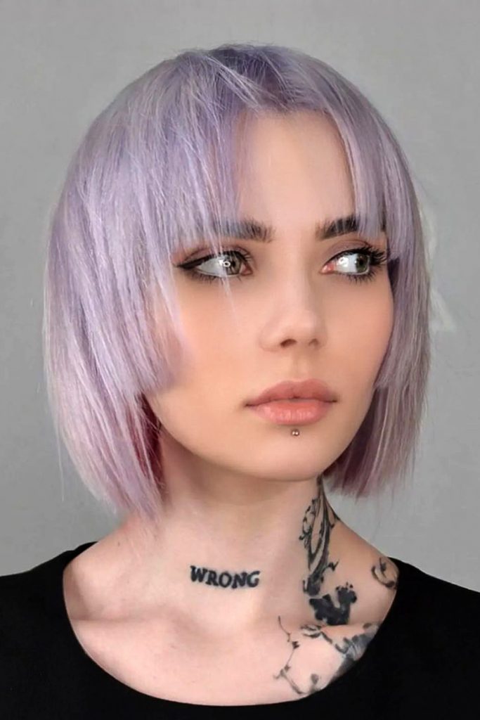 This version of the jellyfish hair cut hits a sweet spot for those who prefer a more moderate length
