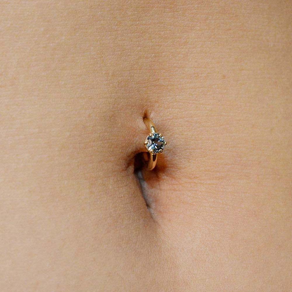 How is a Belly Button Piercing Done?