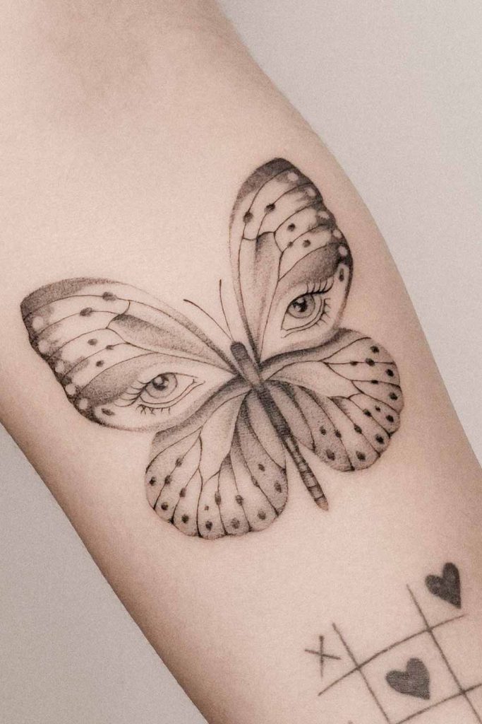 Butterfly with Eyes Tattoo Design