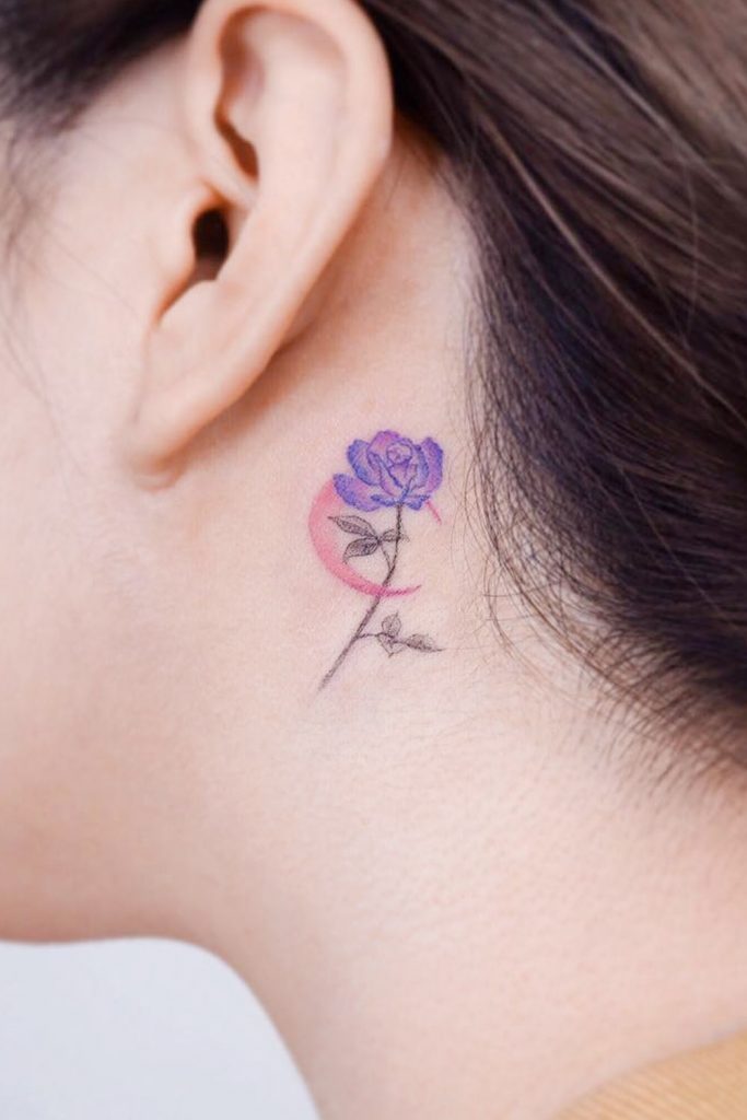 Small Purple Rose Behind the Ear