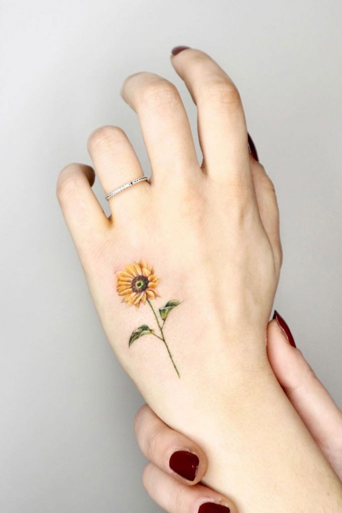 Sun Flower Tattoo on a Hand