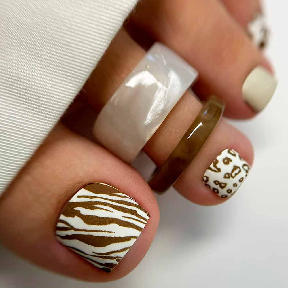 Animal Print Designs #toenail #toenails #pedicure #toenaildesigns #pedicuredesigns