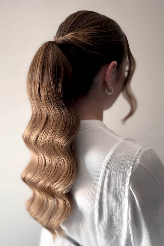 Sleek Ponytail with Deep Waves