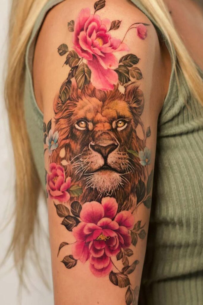 Lion and Flowers Watercolor Arm Tattoo