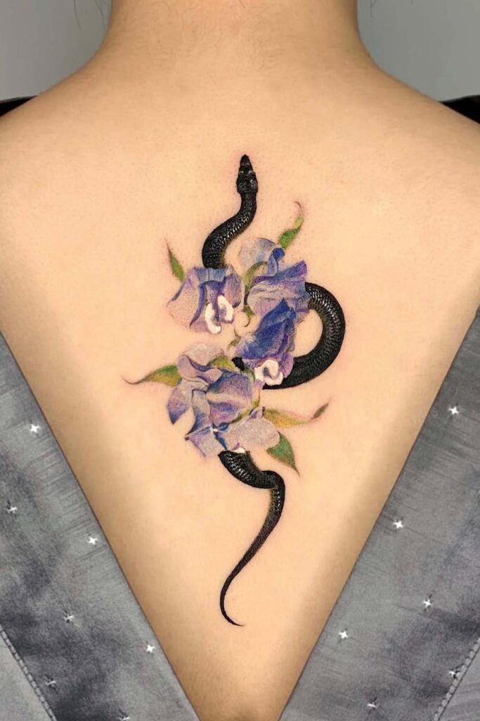 Snake and Flowers Watercolor Back Tattoo