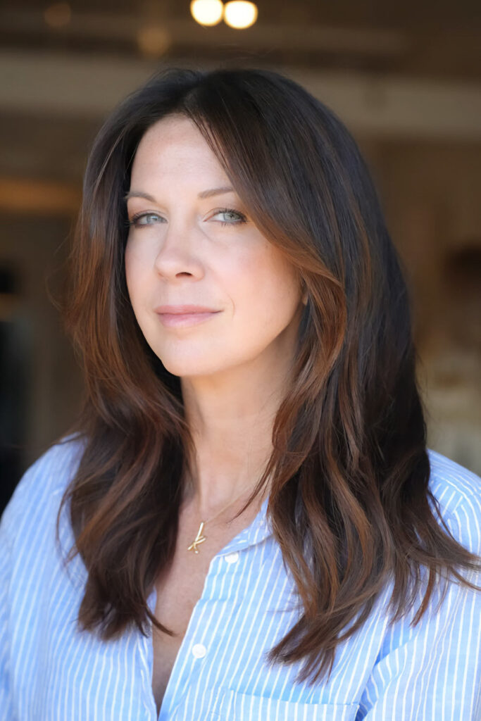 Rich Brunette with Cinnamon-Toned Face-Framing Layers