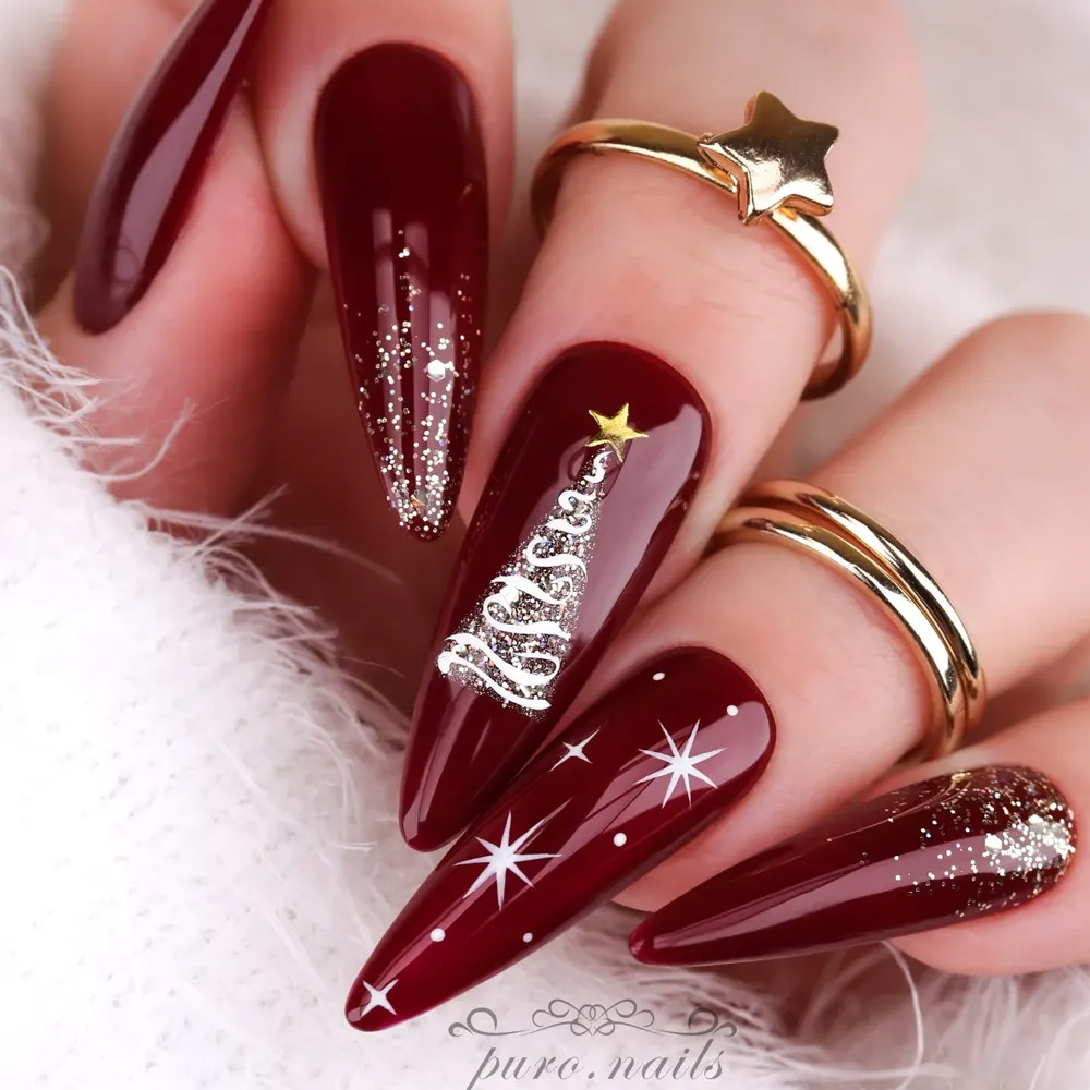 Burgundy Stiletto Nails with Christmas Tree Accent