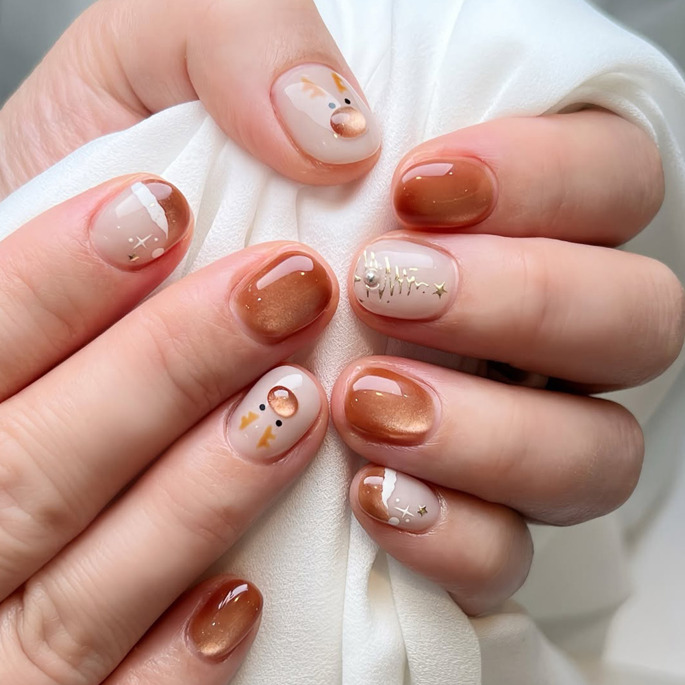 Caramel Nude Winter Nails with Soft Holiday Accents