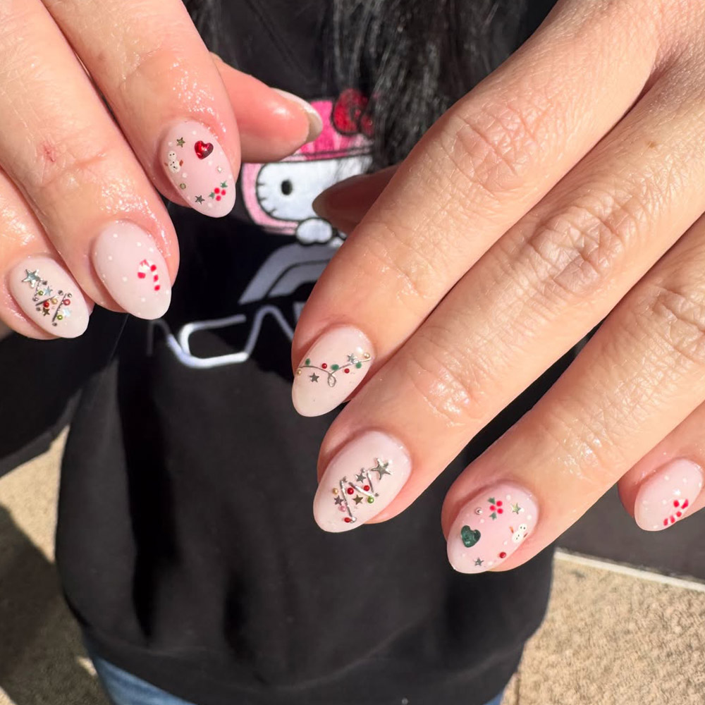Sheer Nude Almond Nails with Tiny Holiday Details