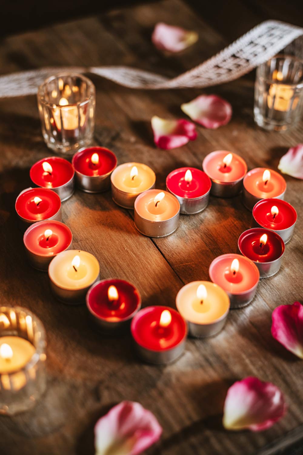 Heart-Shaped Candle Arrangement With Rose Petals