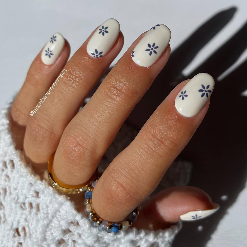 Easter Nail Art with White Color Base and Tiny Flowers