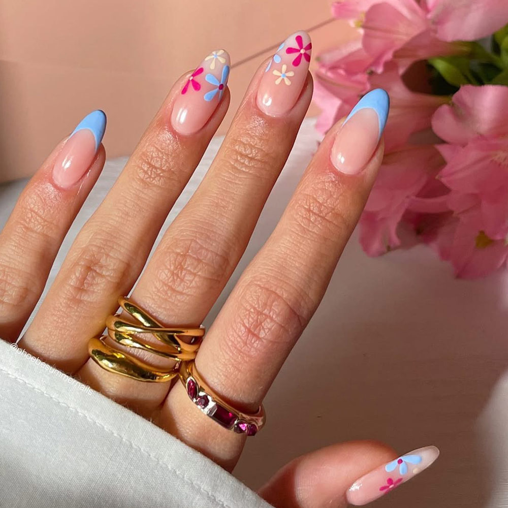 Pastel Blue French Tip Nails With Floral Accents For Spring
