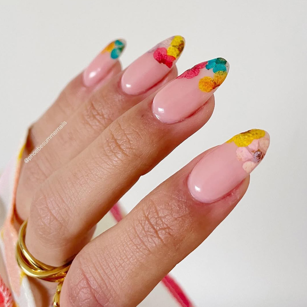 Abstract Floral French Tip Nails In Yellow And Green For Spring
