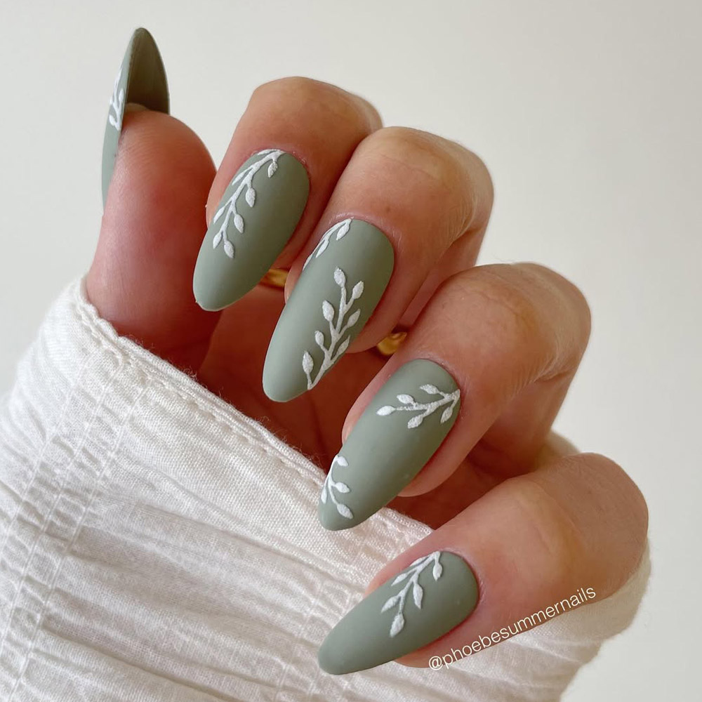 Sage Green Almond Nails With Minimal White Leaf Design For Spring